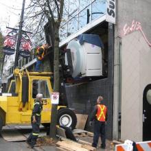 Moving in new MRI machine into medical building.