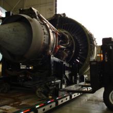 Installing GE90 Jet Engine for AC737 aircraft at YVR Airport.