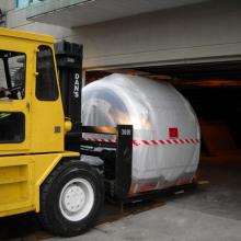 Sqeezing in a MRI machine into building parkade.