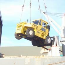 Low Clearance 33000 lbs capacity forklift, lowering into a Ship.