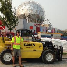 Mini Telehandler working at a local jobsite